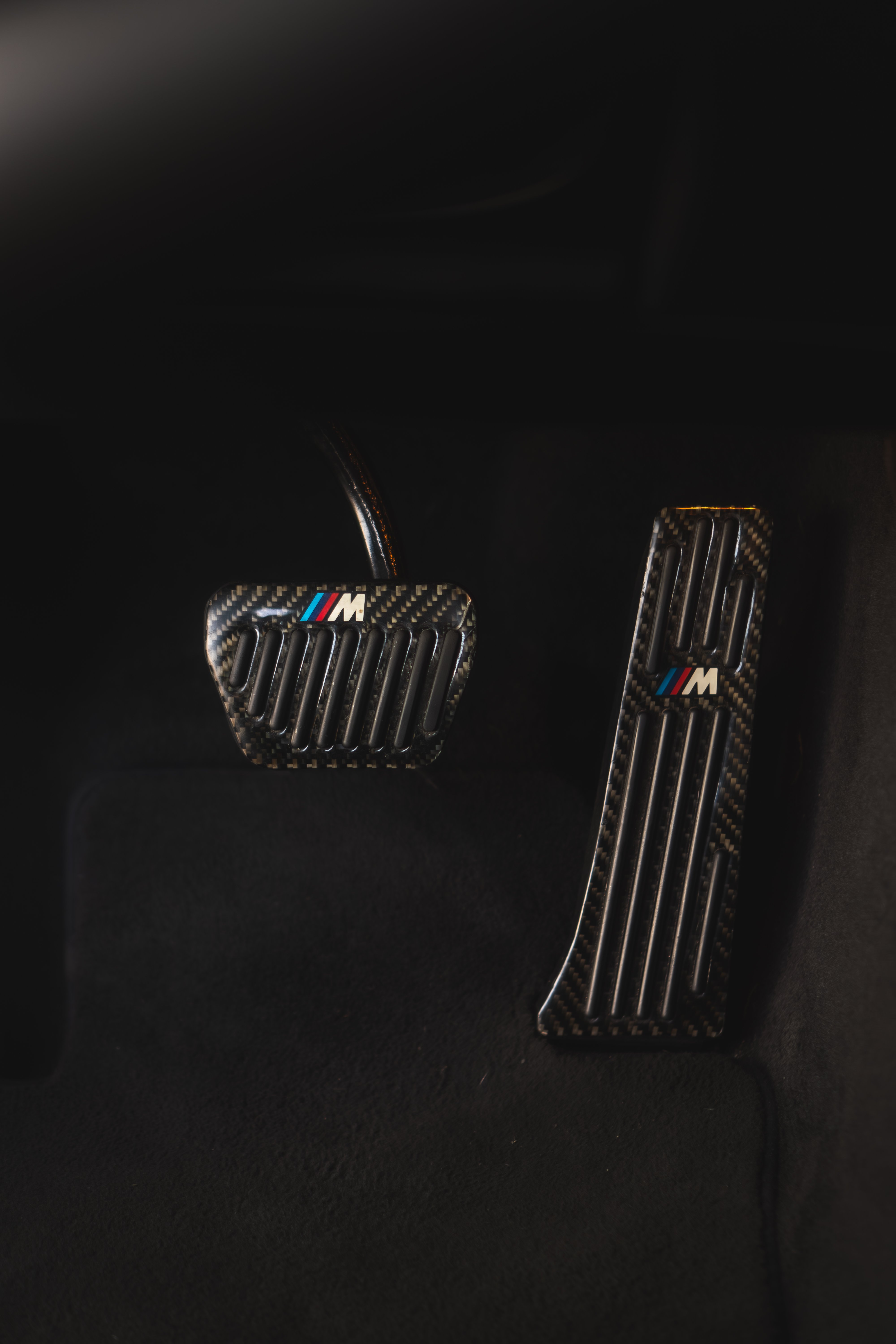 Pedaleiras M Sport em fibra de carbono